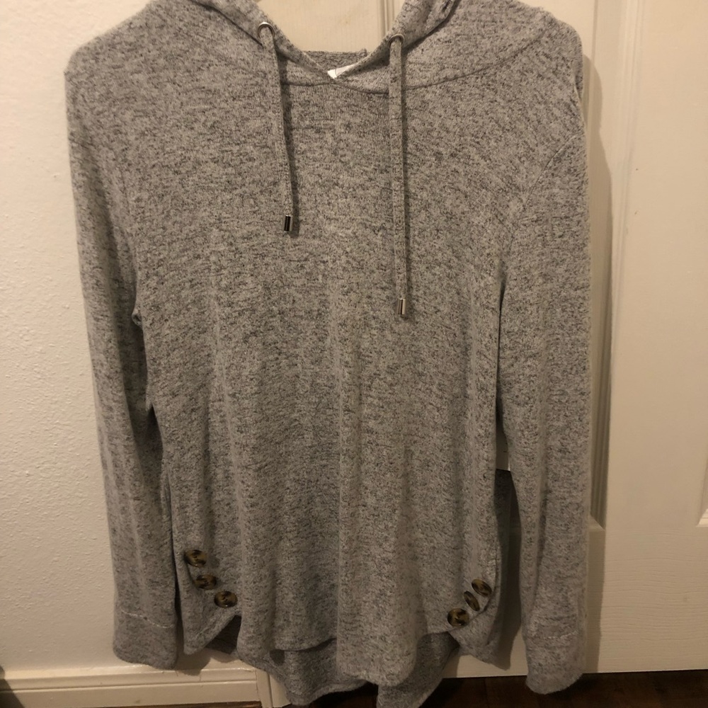 Gray hooded sweater with button accents.